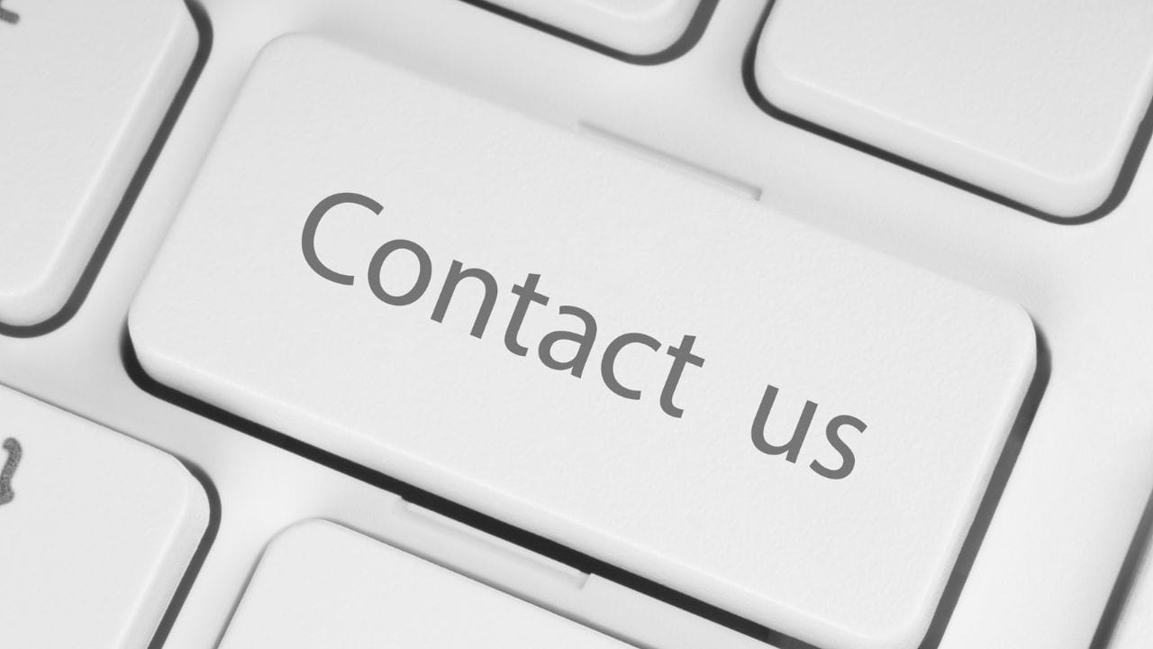 stock image of contact us button on keyboard